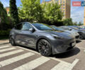Серый Тесла Model Y, объемом двигателя 0 л и пробегом 22 тыс. км за 34000 $, фото 1 на Automoto.ua