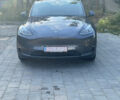 Серый Тесла Model Y, объемом двигателя 0 л и пробегом 30 тыс. км за 27500 $, фото 1 на Automoto.ua
