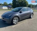 Серый Тесла Model Y, объемом двигателя 0 л и пробегом 24 тыс. км за 30999 $, фото 1 на Automoto.ua