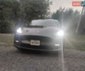 Серый Тесла Model Y, объемом двигателя 0 л и пробегом 25 тыс. км за 28000 $, фото 1 на Automoto.ua