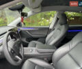 Серый Тесла Model Y, объемом двигателя 0 л и пробегом 19 тыс. км за 33700 $, фото 23 на Automoto.ua