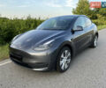 Серый Тесла Model Y, объемом двигателя 0 л и пробегом 27 тыс. км за 28900 $, фото 3 на Automoto.ua
