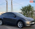 Серый Тесла Model Y, объемом двигателя 0 л и пробегом 13 тыс. км за 32800 $, фото 1 на Automoto.ua