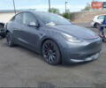 Серый Тесла Model Y, объемом двигателя 0 л и пробегом 29 тыс. км за 27500 $, фото 1 на Automoto.ua