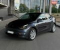 Серый Тесла Model Y, объемом двигателя 0 л и пробегом 55 тыс. км за 25999 $, фото 1 на Automoto.ua