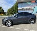 Серый Тесла Model Y, объемом двигателя 0 л и пробегом 28 тыс. км за 27900 $, фото 1 на Automoto.ua
