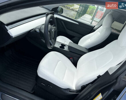 Серый Тесла Model Y, объемом двигателя 0 л и пробегом 55 тыс. км за 26900 $, фото 4 на Automoto.ua