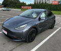 Серый Тесла Model Y, объемом двигателя 0 л и пробегом 55 тыс. км за 26900 $, фото 1 на Automoto.ua