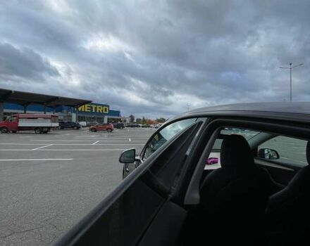 Серый Тесла Model Y, объемом двигателя 0 л и пробегом 51 тыс. км за 28900 $, фото 14 на Automoto.ua