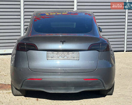 Серый Тесла Model Y, объемом двигателя 0 л и пробегом 93 тыс. км за 27900 $, фото 6 на Automoto.ua