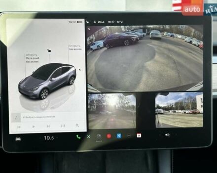 Сірий Тесла Model Y, об'ємом двигуна 0 л та пробігом 27 тис. км за 28999 $, фото 21 на Automoto.ua