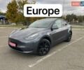 Серый Тесла Model Y, объемом двигателя 0 л и пробегом 51 тыс. км за 28900 $, фото 1 на Automoto.ua