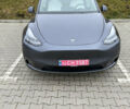 Серый Тесла Model Y, объемом двигателя 0 л и пробегом 64 тыс. км за 27300 $, фото 2 на Automoto.ua