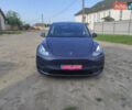 Серый Тесла Model Y, объемом двигателя 0 л и пробегом 41 тыс. км за 26900 $, фото 1 на Automoto.ua