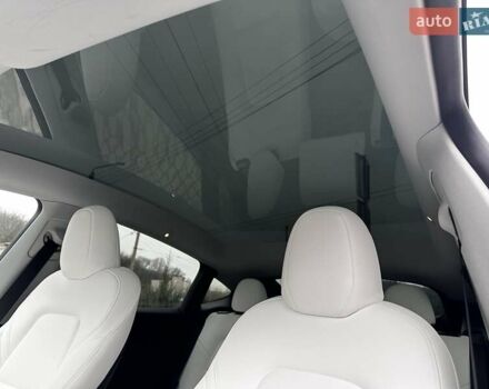 Серый Тесла Model Y, объемом двигателя 0 л и пробегом 24 тыс. км за 28399 $, фото 23 на Automoto.ua