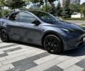 Серый Тесла Model Y, объемом двигателя 0 л и пробегом 26 тыс. км за 33600 $, фото 1 на Automoto.ua