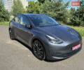Серый Тесла Model Y, объемом двигателя 0 л и пробегом 36 тыс. км за 29900 $, фото 1 на Automoto.ua