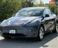 Серый Тесла Model Y, объемом двигателя 0 л и пробегом 16 тыс. км за 28900 $, фото 1 на Automoto.ua
