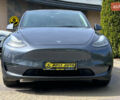 Серый Тесла Model Y, объемом двигателя 0 л и пробегом 16 тыс. км за 28999 $, фото 1 на Automoto.ua