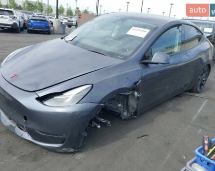 Серый Тесла Model Y, объемом двигателя 0 л и пробегом 29 тыс. км за 27500 $, фото 1 на Automoto.ua