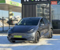 Серый Тесла Model Y, объемом двигателя 0 л и пробегом 55 тыс. км за 28690 $, фото 1 на Automoto.ua