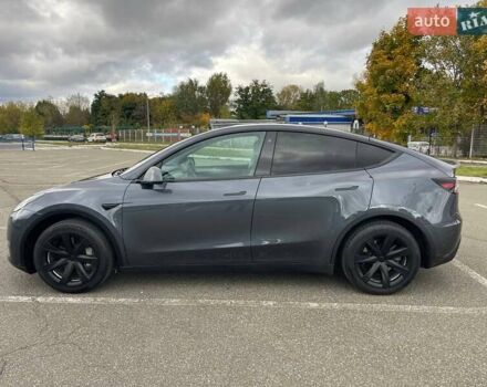 Серый Тесла Model Y, объемом двигателя 0 л и пробегом 51 тыс. км за 28900 $, фото 2 на Automoto.ua