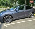 Серый Тесла Model Y, объемом двигателя 0 л и пробегом 29 тыс. км за 29900 $, фото 1 на Automoto.ua