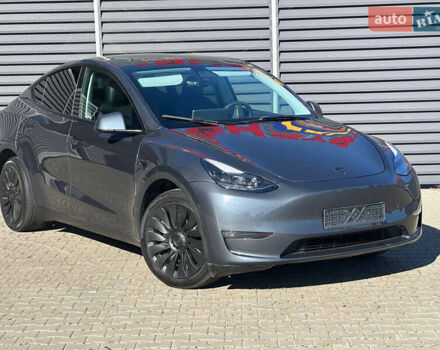 Серый Тесла Model Y, объемом двигателя 0 л и пробегом 93 тыс. км за 27900 $, фото 4 на Automoto.ua