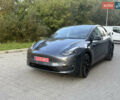 Серый Тесла Model Y, объемом двигателя 0 л и пробегом 49 тыс. км за 27000 $, фото 1 на Automoto.ua