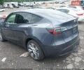 Серый Тесла Model Y, объемом двигателя 0 л и пробегом 57 тыс. км за 11000 $, фото 1 на Automoto.ua