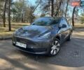 Серый Тесла Model Y, объемом двигателя 0 л и пробегом 56 тыс. км за 25999 $, фото 1 на Automoto.ua