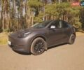 Серый Тесла Model Y, объемом двигателя 0 л и пробегом 28 тыс. км за 32900 $, фото 1 на Automoto.ua