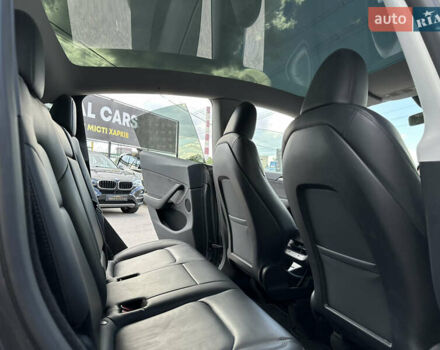 Серый Тесла Model Y, объемом двигателя 0 л и пробегом 46 тыс. км за 29900 $, фото 17 на Automoto.ua