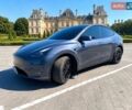 Серый Тесла Model Y, объемом двигателя 0 л и пробегом 27 тыс. км за 31999 $, фото 1 на Automoto.ua