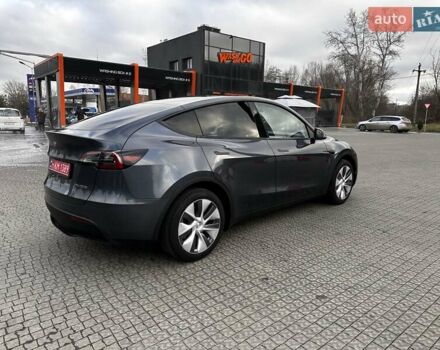 Серый Тесла Model Y, объемом двигателя 0 л и пробегом 24 тыс. км за 28399 $, фото 6 на Automoto.ua