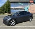Серый Тесла Model Y, объемом двигателя 0 л и пробегом 28 тыс. км за 27900 $, фото 1 на Automoto.ua