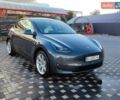Серый Тесла Model Y, объемом двигателя 0 л и пробегом 20 тыс. км за 26999 $, фото 1 на Automoto.ua