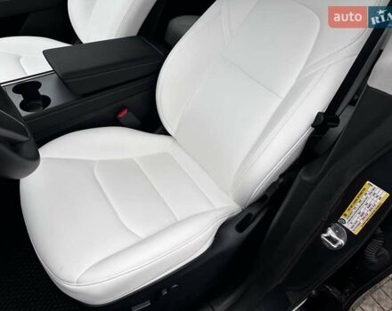 Серый Тесла Model Y, объемом двигателя 0 л и пробегом 24 тыс. км за 28399 $, фото 18 на Automoto.ua