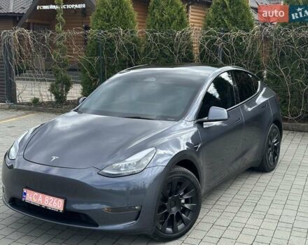 Серый Тесла Model Y, объемом двигателя 0 л и пробегом 9 тыс. км за 28950 $, фото 1 на Automoto.ua