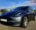 Серый Тесла Model Y, объемом двигателя 0 л и пробегом 34 тыс. км за 28300 $, фото 1 на Automoto.ua