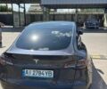 Серый Тесла Model Y, объемом двигателя 0 л и пробегом 44 тыс. км за 25300 $, фото 1 на Automoto.ua