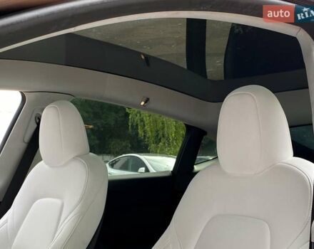 Сірий Тесла Model Y, об'ємом двигуна 0 л та пробігом 51 тис. км за 33999 $, фото 13 на Automoto.ua