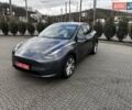 Серый Тесла Model Y, объемом двигателя 0 л и пробегом 24 тыс. км за 28399 $, фото 1 на Automoto.ua