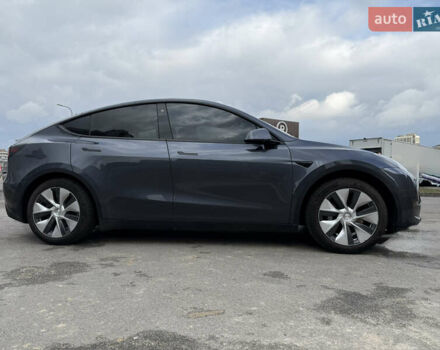Серый Тесла Model Y, объемом двигателя 0 л и пробегом 31 тыс. км за 26999 $, фото 3 на Automoto.ua