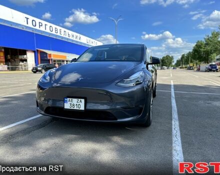 Серый Тесла Model Y, объемом двигателя 0 л и пробегом 13 тыс. км за 28650 $, фото 1 на Automoto.ua