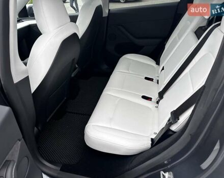 Серый Тесла Model Y, объемом двигателя 0 л и пробегом 24 тыс. км за 28399 $, фото 21 на Automoto.ua