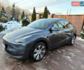Серый Тесла Model Y, объемом двигателя 0 л и пробегом 20 тыс. км за 27999 $, фото 1 на Automoto.ua