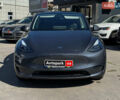 Серый Тесла Model Y, объемом двигателя 0 л и пробегом 42 тыс. км за 29990 $, фото 1 на Automoto.ua
