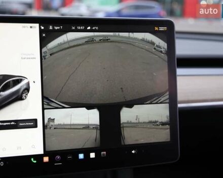 Серый Тесла Model Y, объемом двигателя 0 л и пробегом 50 тыс. км за 33900 $, фото 2 на Automoto.ua
