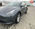 Серый Тесла Model Y, объемом двигателя 0 л и пробегом 56 тыс. км за 28001 $, фото 1 на Automoto.ua